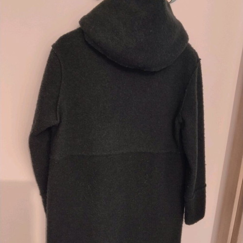 Wool coat in cypress color with oversized hood, used