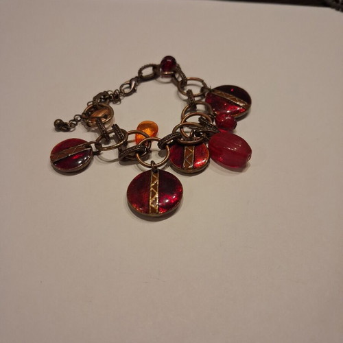 Bracelet with red stones used