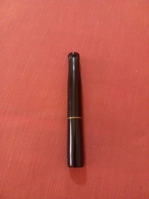 Cigarette holder used for regular cigarettes, not slim