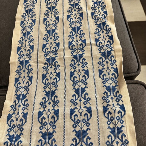 Handmade table runners with colorful and blue-white designs
