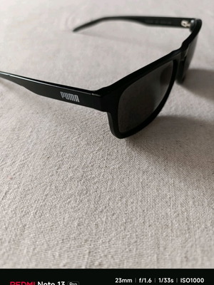 Puma sunglasses like new, black