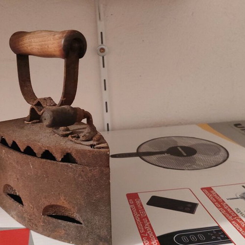 Antique iron used, coal-heated, 100 years old