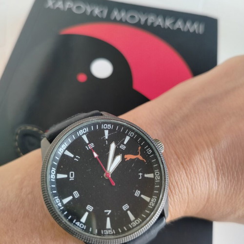 Sport unisex wristwatch 40mm black dial used