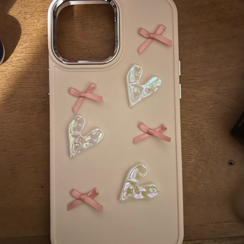 iPhone 13 Pro Max case new with decorative hearts and bows