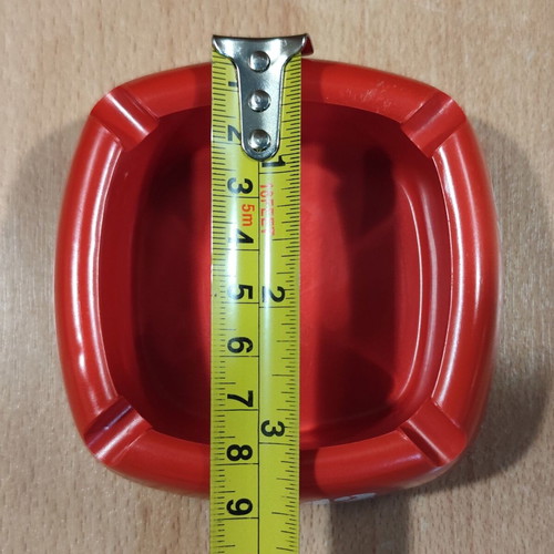 Ouzo 12 used red square plastic ashtray