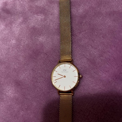 Daniel Wellington women's watch used with gold bracelet