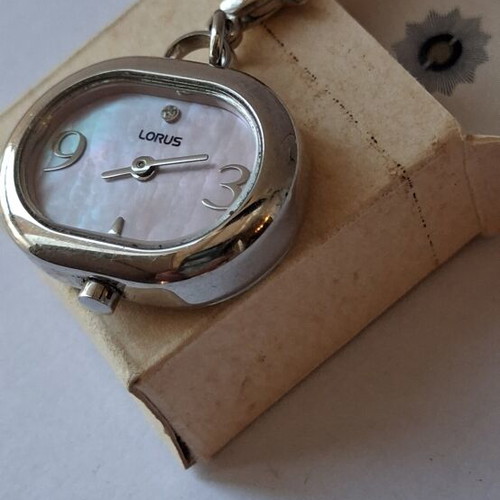 Lorus Quartz watch used, beige and silver, good condition