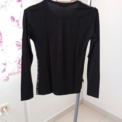 Long-sleeve blouse like new with woman and leopard print