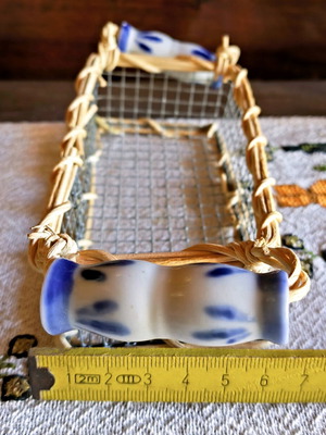 Vintage metal basket with porcelain handles used