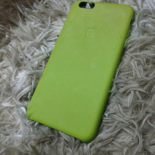 iPhone case used silicone pistachio with signs of wear