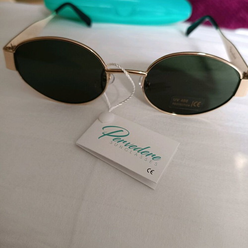 Pervedere women's sunglasses new with oval lenses and gold frame