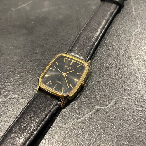 Orient VX used, needs battery, black and gold