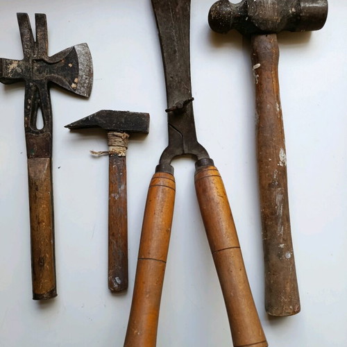 Set of old handmade tools used with wooden handles