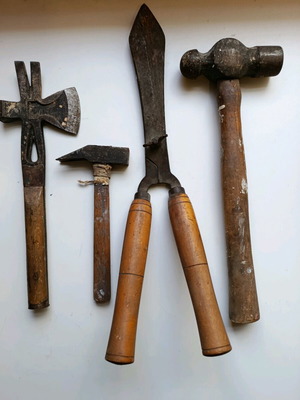Set of old handmade tools used with wooden handles