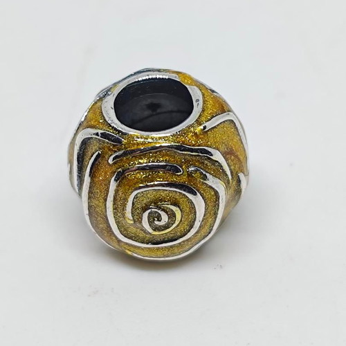 Silver charm bead with gold glitter enamel spiral design like new