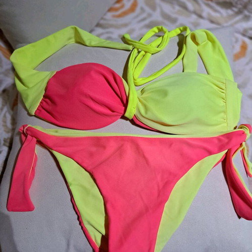 Bikini reversible like new with detachable cord, pink and yellow