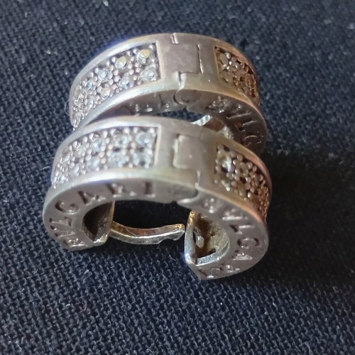 Silver earrings used with stones