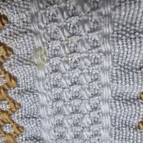 Vintage woven quilt used, shades of beige and gold