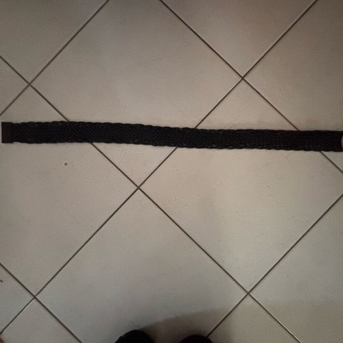 Black knitted belt like new with silver buckle and black stone