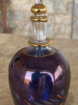 Vintage glass perfume bottle like new, purple blue with flower design
