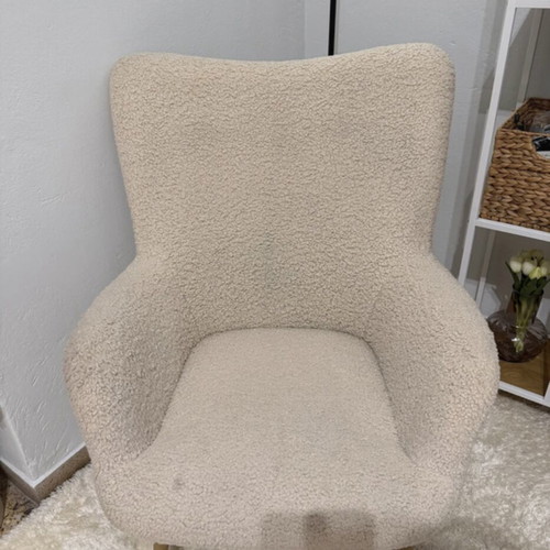 Armchair used, off-white fuzzy with steel legs