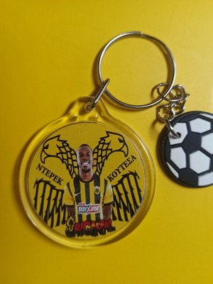 AEK Derek Koutesa Round Keychain New