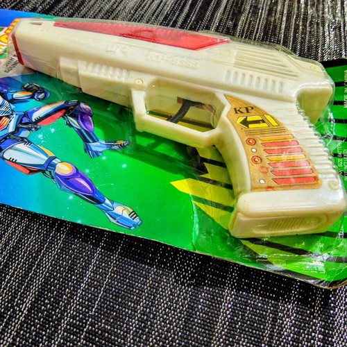 Vintage Space Laser Gun new, sealed in blister pack
