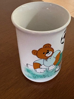 Late 80s children's cup with teddy bear playing football like new