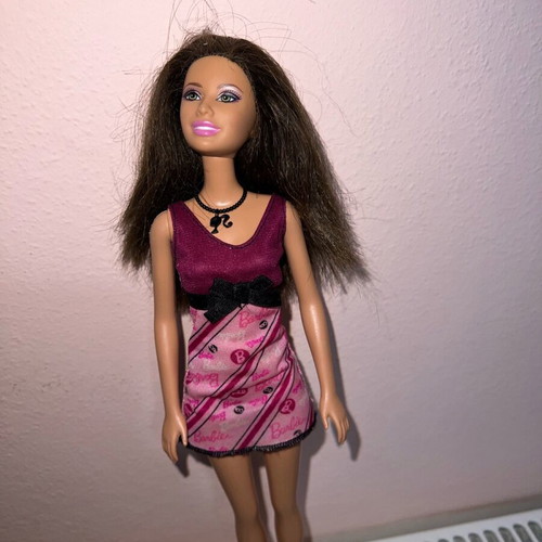 Barbie Purple Dress Doll 2002 Version like new with purple dress and black sandals