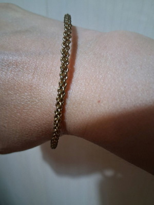 Women's bracelet like new gold-tone braided design