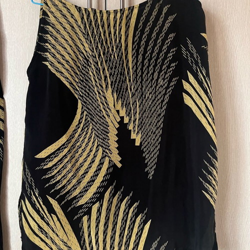 Set palazzo pants and asymmetric top used, size S-M