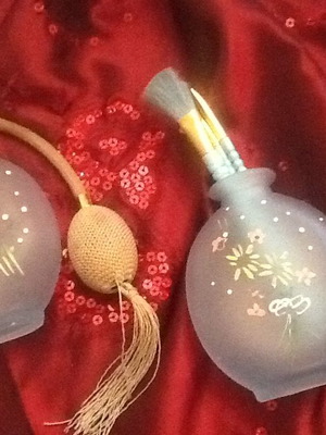 Opalina makeup set used with vaporizer and brush holder