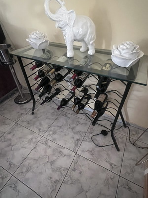 Wine rack forged iron with glass top holds 20 bottles