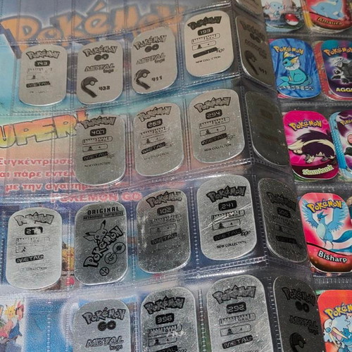 Pokemon GO The Original Metal Tags Album like new with 270 metal tags