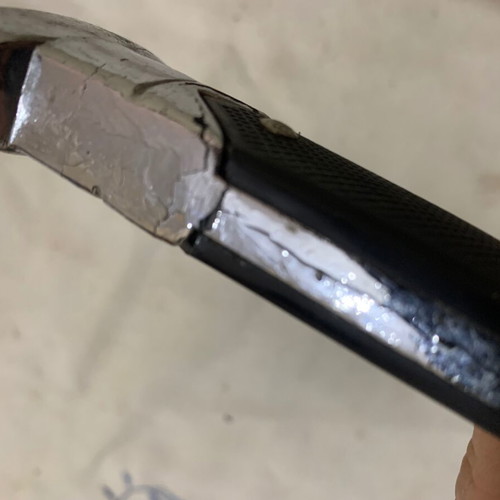 Decorative knife used with sheath and cracked aluminum handle