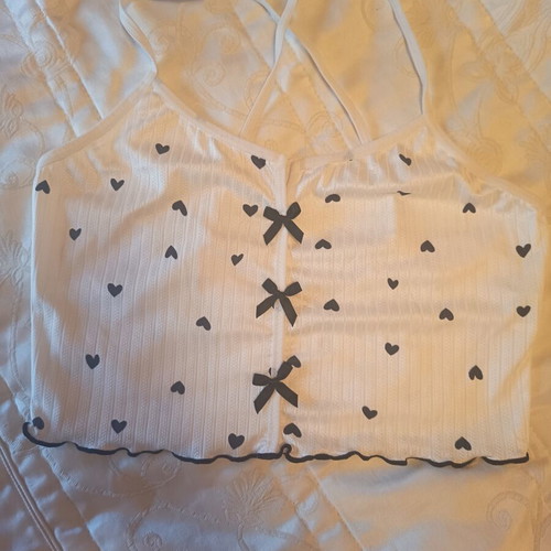 Women's white crop top with black hearts