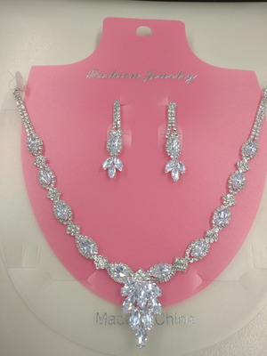 Jewelry set new with silver necklace and earrings with white stones