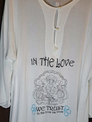 Sheer blouse used with embroidery and pearl buttons, size XL