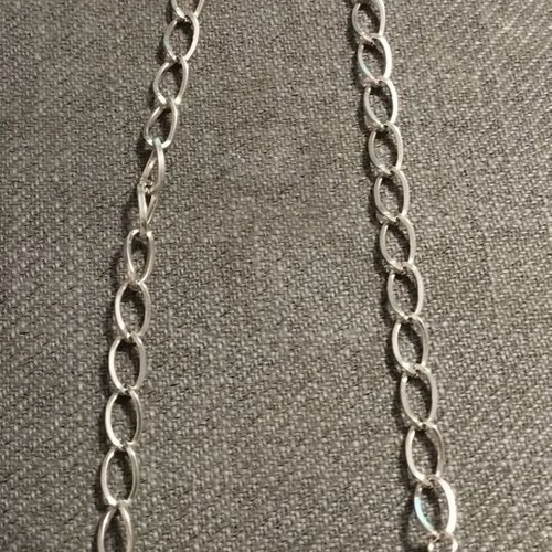 Long women's necklace with large black stones and silver chains like new