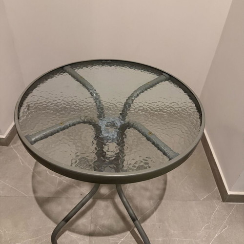 Round balcony table like new with metal frame and glass top