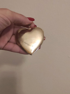 Large heart pendant like new, gold color with photo holder