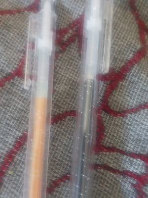 Set of 2 pens, black and yellow, glitter