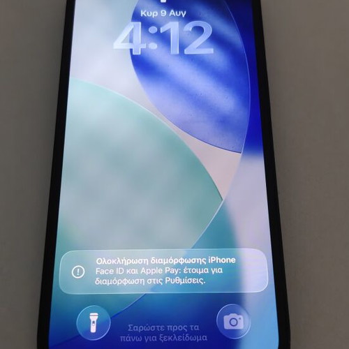 iPhone 13 128GB used with charger, earphones, cases, and power bank