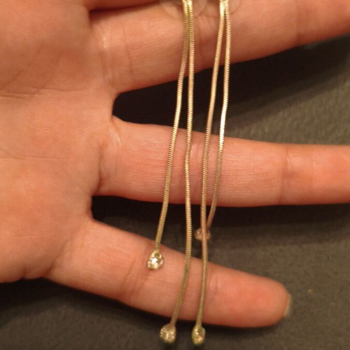 Dangling earrings used, silver tone with double thin chains and clear rhinestones