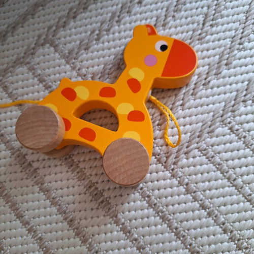 Took Toys sliding giraffe toy used