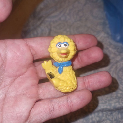 Big Bird figure from Sesame Street with blue scarf