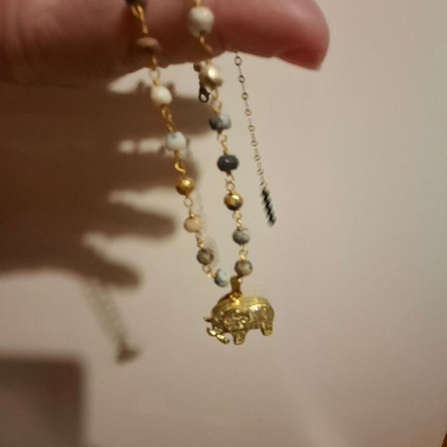 Handmade necklace like new with bicolor beads and gold elephant detail