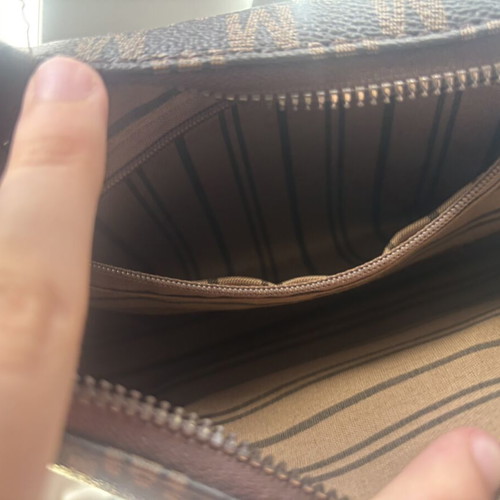 Brown crossbody bag like new with charm flower