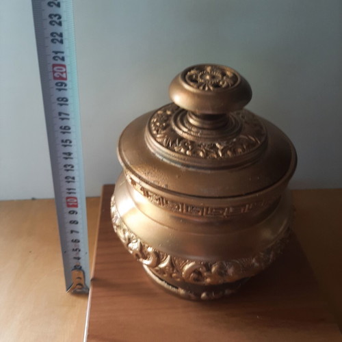 Vintage metal vessel with wooden base used, decorative aroma container