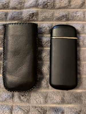 Black lighter like new with case